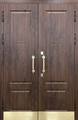 Двустворчатая стальная термодверь для храма с отбойниками и отделкой плитами МДФ